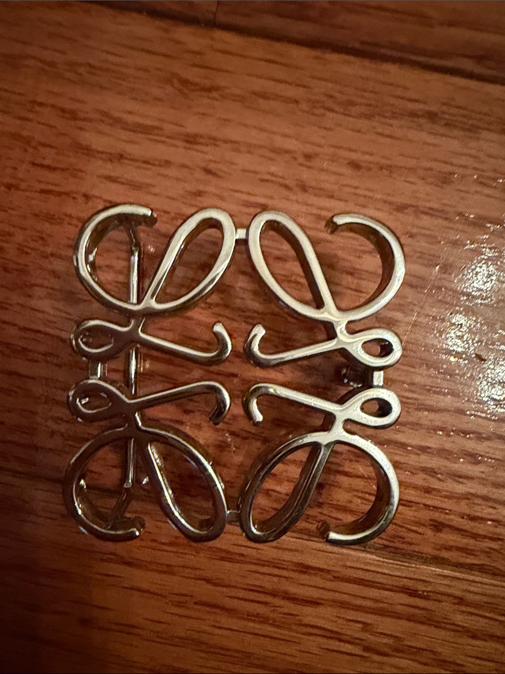 Anagram belt buckle